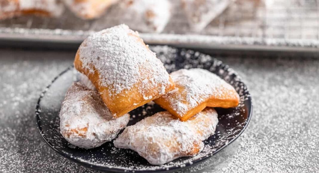 A dessert plate filled with beignets.
