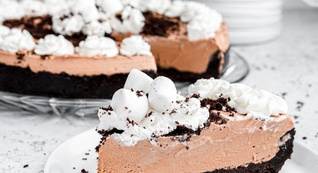 Oreo crust no bake pie on a plate.
