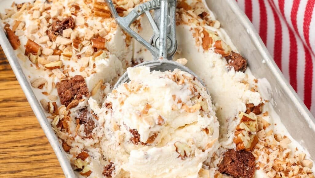 kitchen sink ice cream in a bread pan with an ice cream scoop